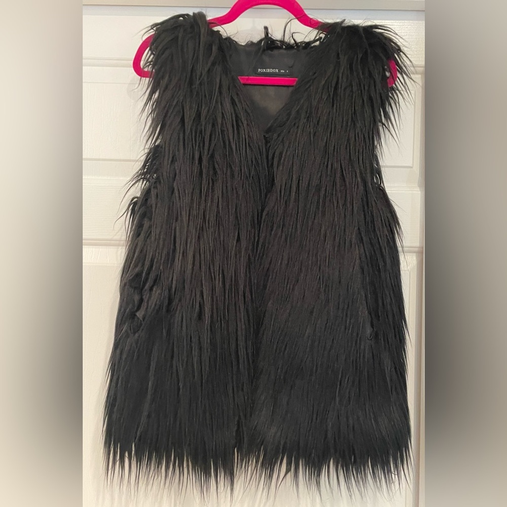 Foxiedox black vest. Perfect condition.
